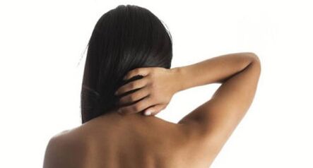 The girl shows her neck from soon back